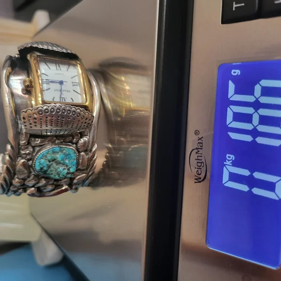 Gold and Silver Watch with Intricate Detailing